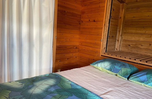 Ginoza Hotel | KubumusoAsunaro A log house where you can feel the warmth of wood/Kunigami-gun Okinawa