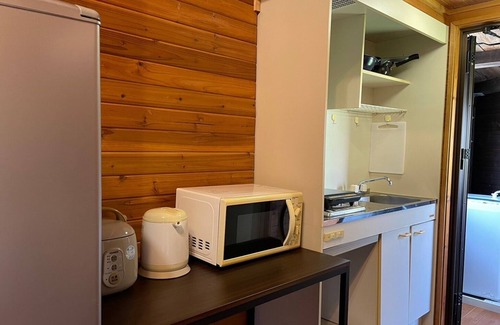 Ginoza Hotel | KubumusoAsunaro A log house where you can feel the warmth of wood/Kunigami-gun Okinawa