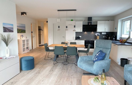 Tossens Apartment | KÜSTE33/48 - Family time. Sauna. Roof terrace.