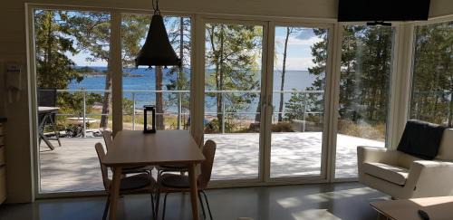 Grisslehamn Cabin | Kvarnsands Strandstugor/Kvarnsand Beach Lodges