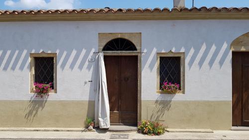 Riola Sardo House | L'AGRUMETO SEGRETO