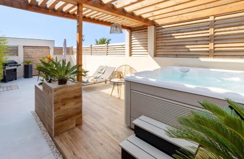 Le Somail Apartment | L'entre deux-suite romantique - jacuzzi privatif - clim réversible - wifi