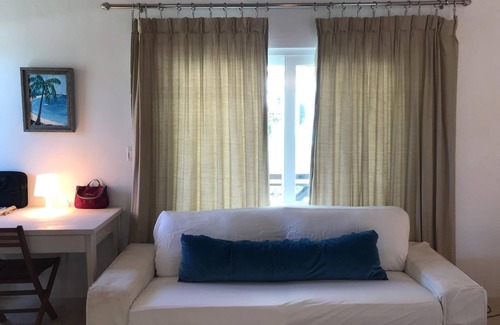 North Palmetto Point Cottage | La Bougainvillea Boutique Hotel - Private cottage