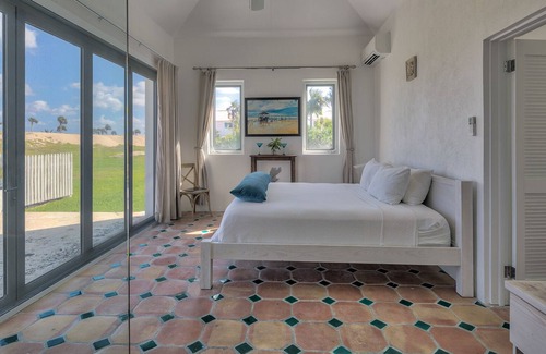 North Palmetto Point Apartment | La Bougainvillea Boutique Hotel - Garden view suite