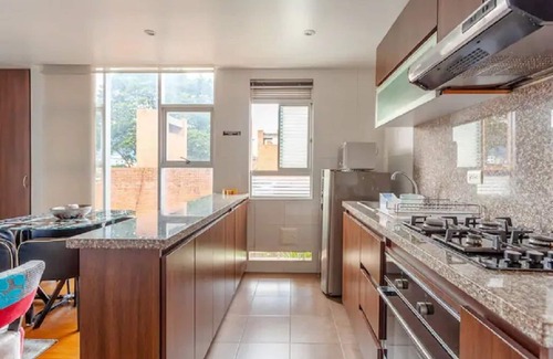 Usaquen Apartment | La Calleja Warm and Illuminated