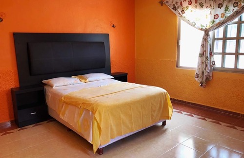 Chelem House | La casa naranja de chelem