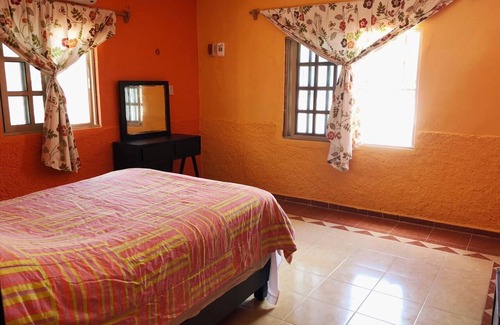 Chelem House | La casa naranja de chelem