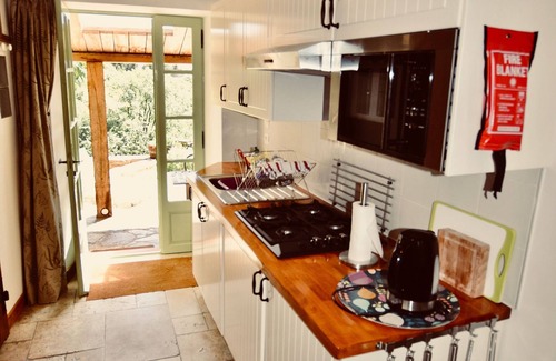 Riols Cottage | La Chataigne - stylish, family friendly gite with heated pool, playground and terraces