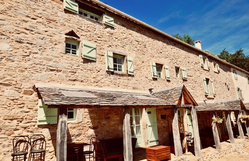 Riols Cottage | La Chataigne - stylish, family friendly gite with heated pool, playground and terraces