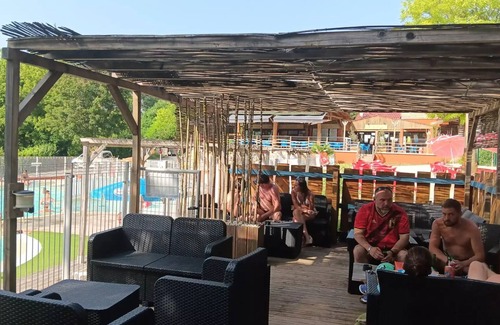 La Cassagne House | La Grande Prade Campsite* - Noyers mobile residence with semi-covered wooden terrace for 5/6 people + TV-TNT + AIR CONDITIONING for 6 people