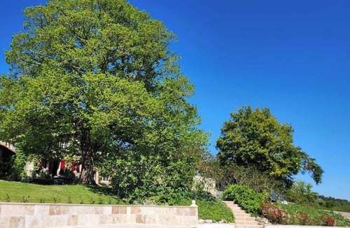 Celles Apartment | La Juliette, a cute studio in an old farmhouse on the side of a hill.