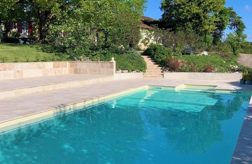 Celles Apartment | La Juliette, a cute studio in an old farmhouse on the side of a hill.