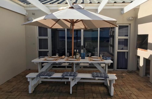 Sandbaai House | La Mer, a beautiful beachfront home in Sandbaai