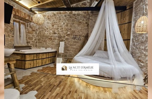 Norma Apartment | La Nuit d'Amélie. a cozy retreat with hot tub.