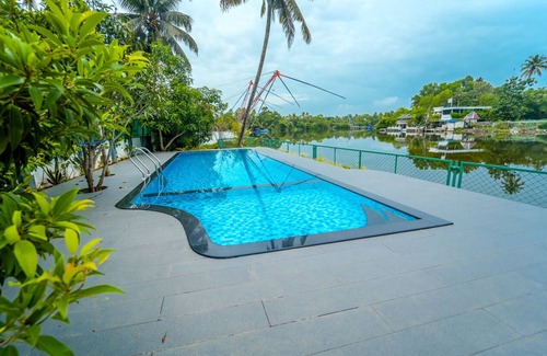 Edapalli House | La Riva Pool Villa Kochi By VOYE HOMES