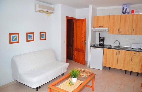 Cala Agulla Apartment | La Roca Azul Apartment with terrace and sea view, 1 bedroom, 1 living room, 1 bathroom, communal pool