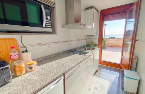 Pedrena Apartment | La Rotiza II Terraza con vistas al mar