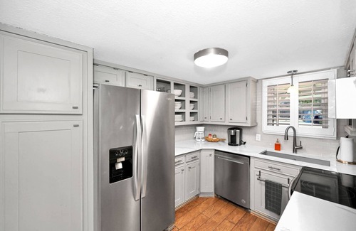 Leisure Land House | Lady of the Lake! Lake Front Property with Boathouse, Pet Friendly, Hot Tub, & Outdoor Sitting Area