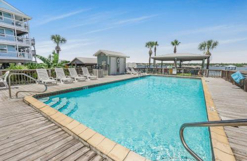 Gulf Shores House | Lagoon Landing 202- Beautifully decorated condo with balcony & pool steps to beach & lagoon