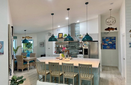 Saint James City House | Laid Back Old Florida Style Home with Pool and Hammock Gardens