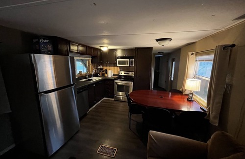 Buchanan Dam Cottage | Lake Buchanan Water Front Cabin ~ Hot Tub, Fire Pit lounge, Grill, Kayaks.