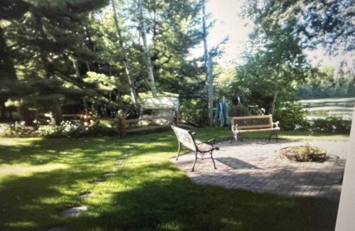 Holcombe House | Lake cabin on Holcombe flowage. Loft views, fire pit, and nearby hiking.