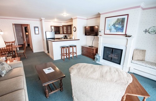 Boyne City Condo | Lake Charlevoix at Your Door | Ground-Level Balcony Escape | Private Beach