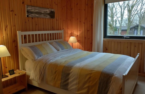 Welton Cabin | Lake District lodge near Greystoke with wood burner and views toward Blencathra.