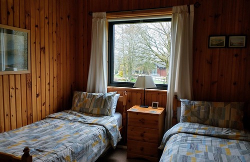Welton Cabin | Lake District lodge near Greystoke with wood burner and views toward Blencathra.