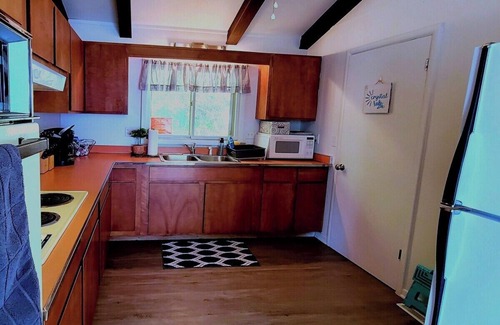 Lake Township Cottage | Lake Escape - PRIVATE LAKEFRONT WITH KAYAKS, DOCK, AND BEACH BONFIRE RING!