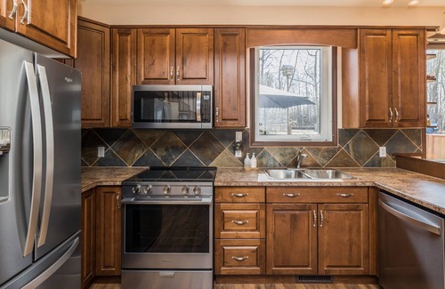 Westerose Cabin | Lake front cabin w/hot tub & firepit, close to The Village at Pigeon Lake.