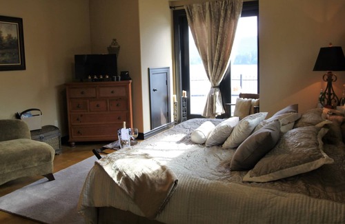 McKenna Apartment | Lake Front Castle Style Custom Home Balcony Suite
