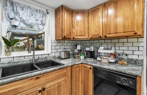 Cloverdale Cottage | Lake front cottage with private beach and docks!