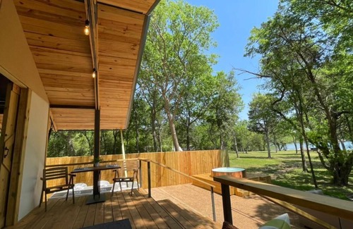 Bastrop Cabin | Lake front glamping cabin. Bathroom inside.