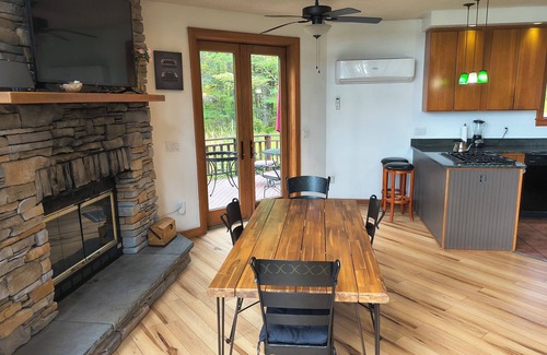 Town of Highland House | Lake Front Heated Floors Romantic Hot Tub Firepit Foosball Ski Screen Porch Boat