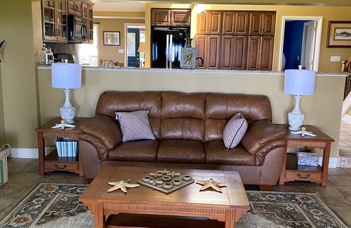 Irving House | Lake Front Home. Private stairs to private beach and bay. upscale 5 bedroom home