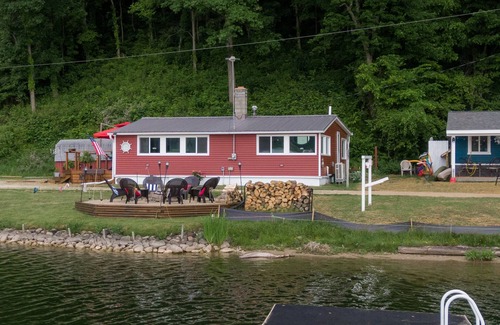 Dowling Cottage | Lake front property with a relaxing front deck overlooking Bristol Lake