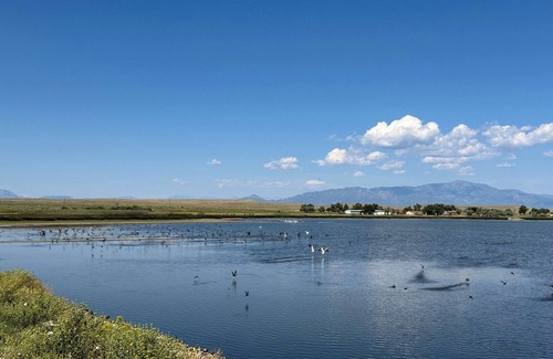 Walsenburg RV Rental | Lake front RV site with stunning views of the Spanish Peaks