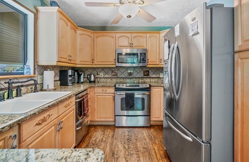 Cumming House | Lake Home, Dock, Hot Tub and Pet Friendly