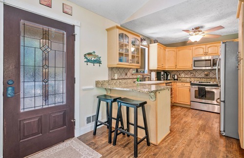 Cumming House | Lake Home, Dock, Hot Tub and Pet Friendly