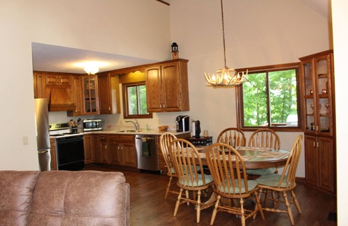 Kendall Ski Chalet | Lake House on a 4 Acre Wooded Lot With Hot Tub, wooded trails & kayaks!