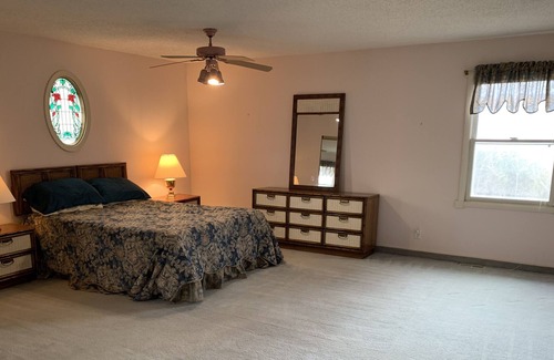 Protem House | Lake house with dock access right out back. Beautiful lake views. Great fishing.