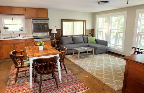 North Jay Cottage | Lake House with Swim Area, Dock, Deck, Canoe, & Paddle Boat - 1BR+, Sleeps 4-6