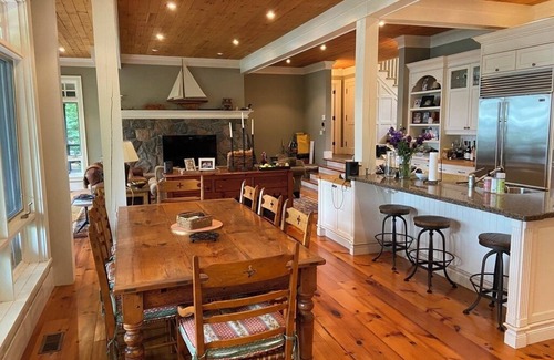 Muskoka Lakes Cottage | Lake Joseph Luxury Rental with 2-story Boathouse. Tennis & Pickleball Optional.