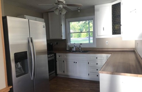 Traverse City Cottage | Lake Leelanau Cottage with Stunning Sun Set Views. 10 Miles from TC!