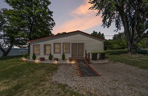 Traverse City Cottage | Lake Leelanau Cottage with Stunning Sun Set Views. 10 Miles from TC!