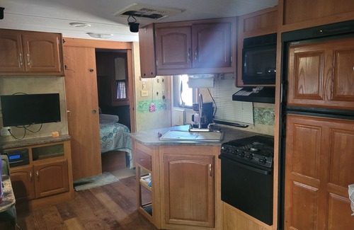 Sulphur House | Lake Life at the Arbuckles! No Hassle Camping! Stationary campers ready for fun!