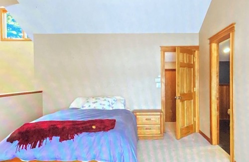 Brant Lake Cabin | Lake Lodge on Brant Lake with direct lakefront, dock access, and amazing views!