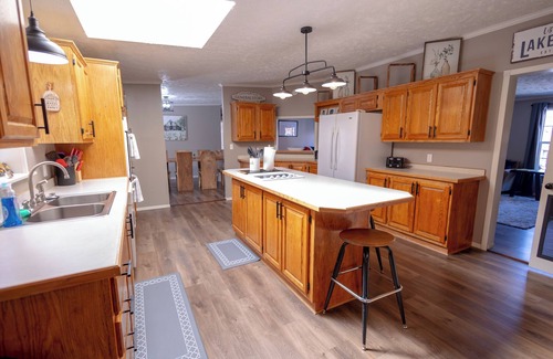 Brixey House | Lake Longbow-10 acre STOCKED lake, 80 acres, 4-wheeler/walking trails, swimming