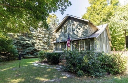 Holland House | Lake Michigan Beach Home in Holland, across st from beach, with firepit, grill